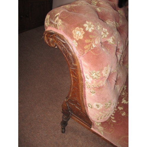 330 - A late 19th century day bed with carved walnut frame and red upholstery, in good used condition. App... 