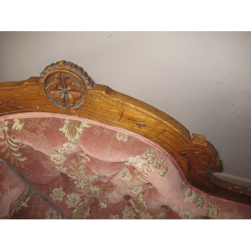 330 - A late 19th century day bed with carved walnut frame and red upholstery, in good used condition. App... 