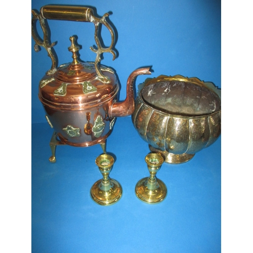 A parcel of antique copper and brass items, to include candlesticks an ornate kettle and a plant pot, all in good used condition