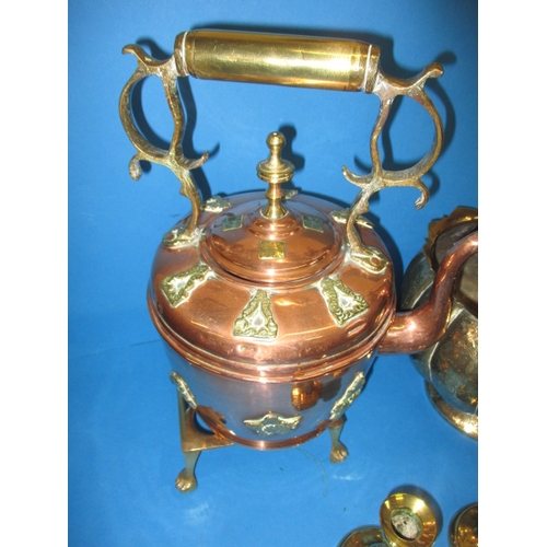 364 - A parcel of antique copper and brass items, to include candlesticks an ornate kettle and a plant pot... 