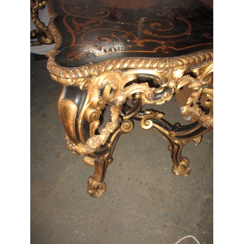 301 - A late 19th  early 20th Century ebonised and gilt wood inlaid corner table, having various woods and... 