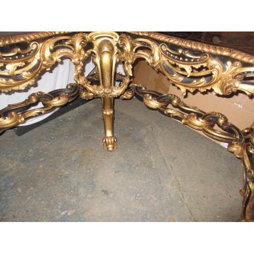 301 - A late 19th  early 20th Century ebonised and gilt wood inlaid corner table, having various woods and... 