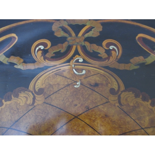 301 - A late 19th  early 20th Century ebonised and gilt wood inlaid corner table, having various woods and... 