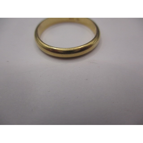 73 - A 750 yellow gold wedding band, approx. ring size ‘M’, approx. width 3.1mm, approx. weight 3g in goo... 