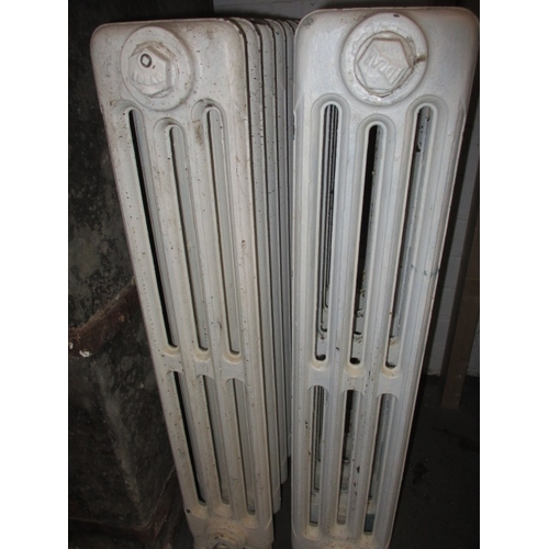 319 - Two early 20th century cast iron radiators, both in used condition and not tested as to function, on... 