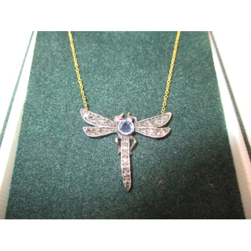 107 - An 18ct gold necklace with antique dragonfly pendant set with diamonds, ruby and sapphire, in good p... 