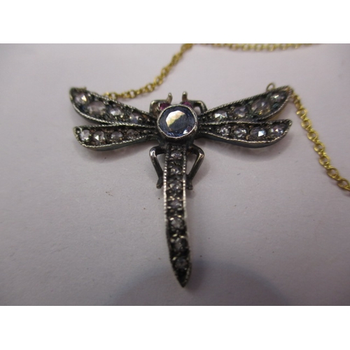 107 - An 18ct gold necklace with antique dragonfly pendant set with diamonds, ruby and sapphire, in good p... 