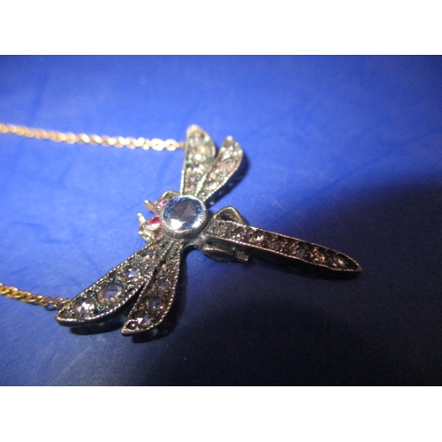 107 - An 18ct gold necklace with antique dragonfly pendant set with diamonds, ruby and sapphire, in good p... 