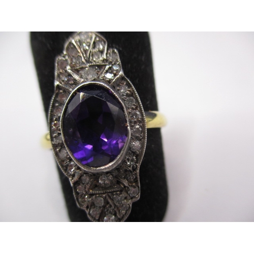 23 - A vintage 15ct yellow gold ring with central boat shaped amethyst surrounded by old cut diamonds, ap... 