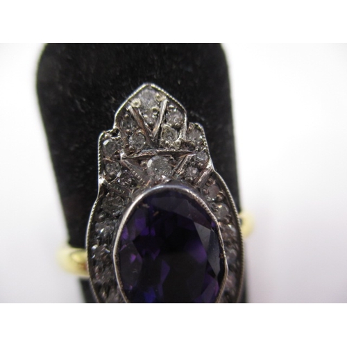 23 - A vintage 15ct yellow gold ring with central boat shaped amethyst surrounded by old cut diamonds, ap... 