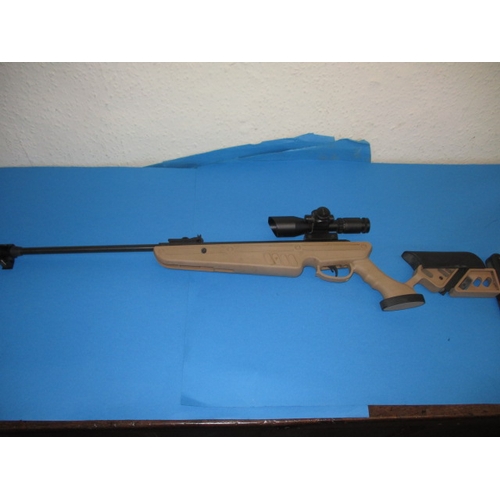 287 - A Swiss Arms TG1 .22 break barrel air rifle, having scope and laser sight, in good working order wit... 