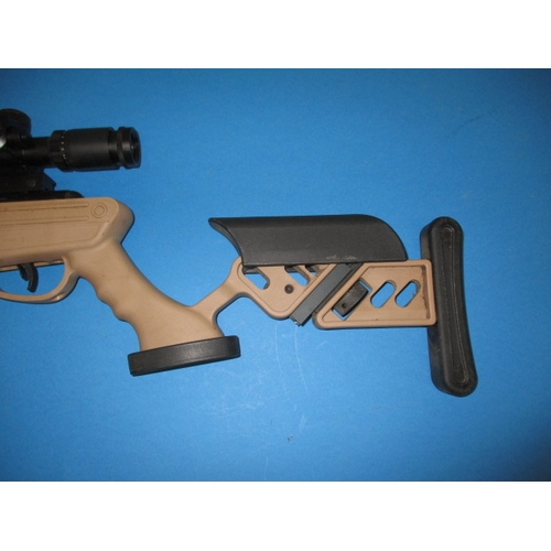 287 - A Swiss Arms TG1 .22 break barrel air rifle, having scope and laser sight, in good working order wit... 