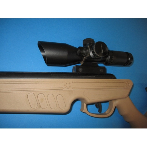 287 - A Swiss Arms TG1 .22 break barrel air rifle, having scope and laser sight, in good working order wit... 