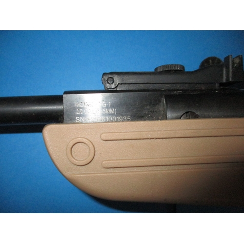 287 - A Swiss Arms TG1 .22 break barrel air rifle, having scope and laser sight, in good working order wit... 