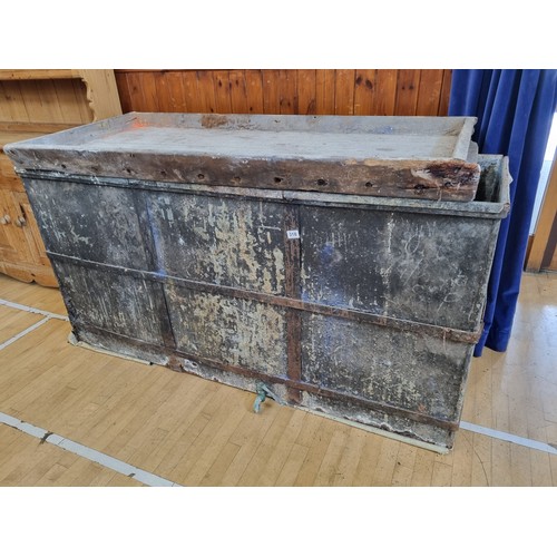 318 - A large antique two compartment metal tank, with iron banded sides and brass taps, possibly used for... 