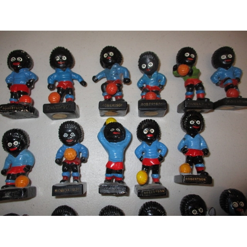 52 - A quantity of vintage Robertson’s advertising figures, band and footballers. All in good used condit... 