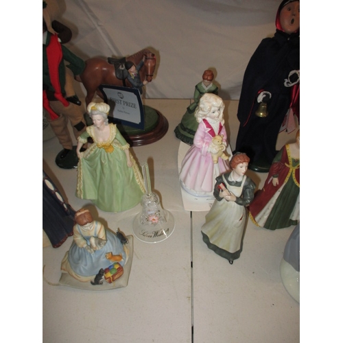 61 - A quantity of figurines to include Royal Doulton and Nao examples. In used condition