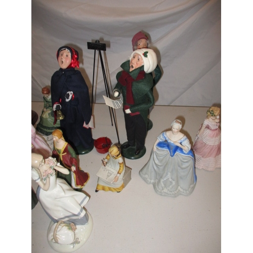 61 - A quantity of figurines to include Royal Doulton and Nao examples. In used condition