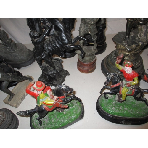 63 - A large quantity of 19th Century and later spelter figures, to include a lamp. Some damages