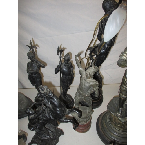 63 - A large quantity of 19th Century and later spelter figures, to include a lamp. Some damages