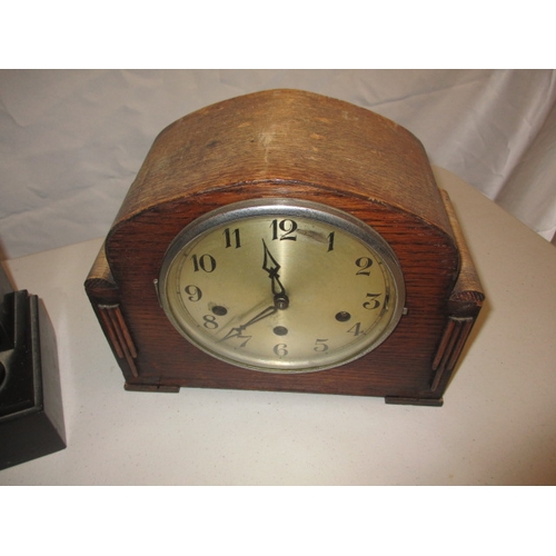 65 - 4 vintage clocks to include a slate example. Not tested as to functioning