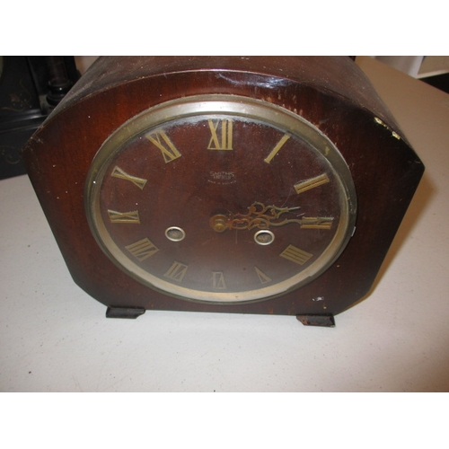 65 - 4 vintage clocks to include a slate example. Not tested as to functioning