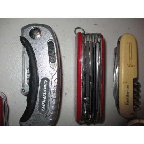 67 - A parcel of vintage pocket knives and bottle openers. In used condition