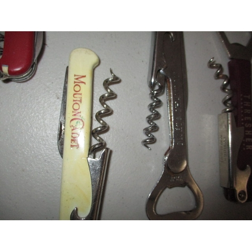 67 - A parcel of vintage pocket knives and bottle openers. In used condition