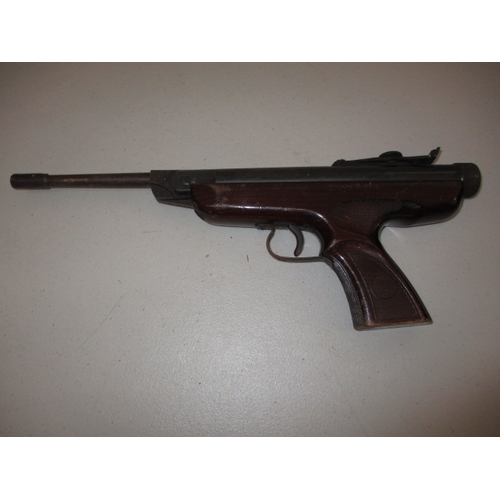 68 - A vintage, ‘original’ break barrel air pistol, in working order, with age related marks