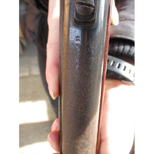 68 - A vintage, ‘original’ break barrel air pistol, in working order, with age related marks