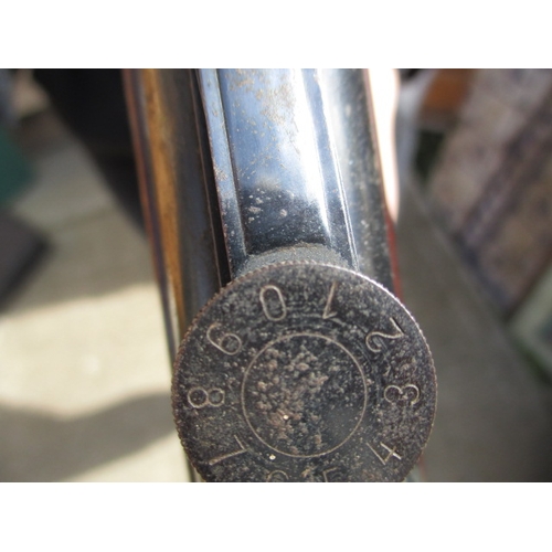 68 - A vintage, ‘original’ break barrel air pistol, in working order, with age related marks