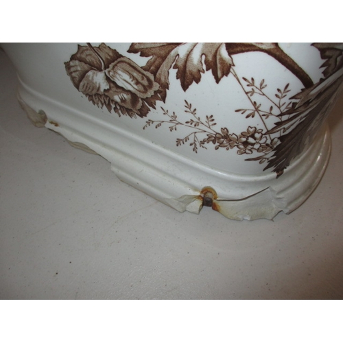 72 - A Victorian water closet base, with floral polychrome decoration. With some damages to base fixings