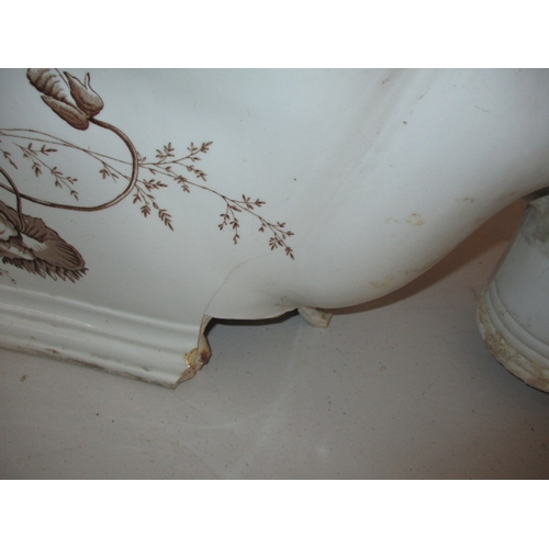 72 - A Victorian water closet base, with floral polychrome decoration. With some damages to base fixings