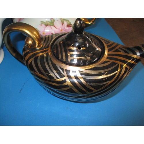 84 - A parcel of collectable teapots, to include a Victorian Jackfield black glazed example, all in good ... 