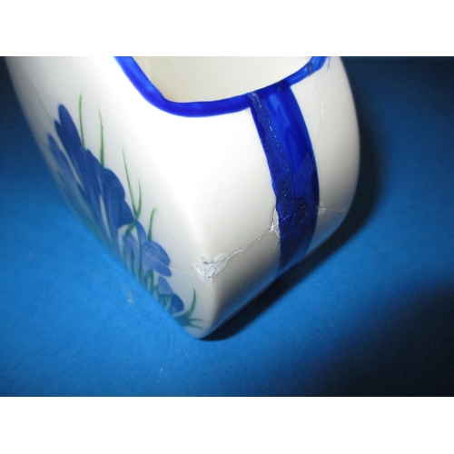 87 - A Wedgwood Clarice Cliff Bonjour 3 piece teaset in the Blue Crocus design, the sugar bowl has been r... 