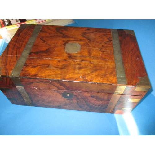 88 - An antique walnut brass bound writing box, having bottles and secret drawer, in need of restoration