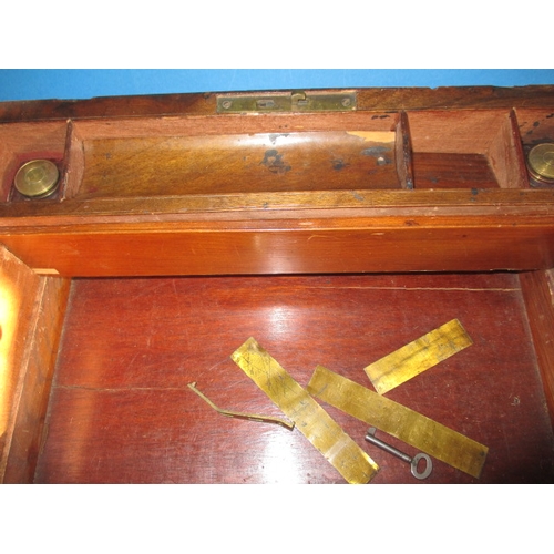 88 - An antique walnut brass bound writing box, having bottles and secret drawer, in need of restoration