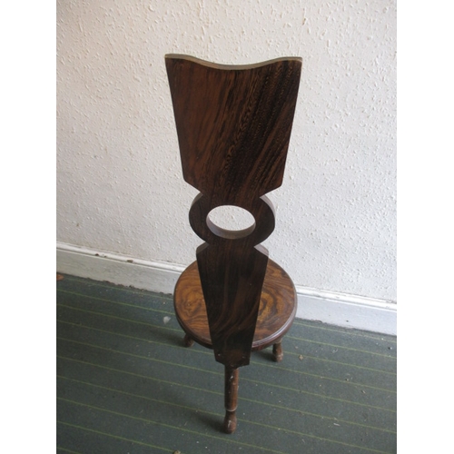 93 - A hard wood hall chair, having slender back splat, having use-related marks