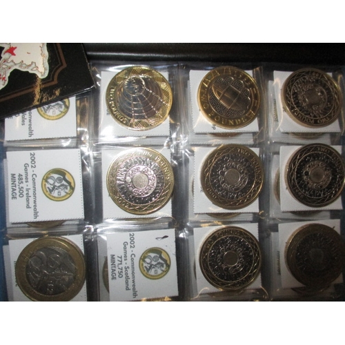 99 - A large quantity of collectable £2 coins, some in uncirculated condition in packaging, over 75 in to... 