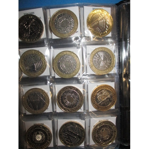 99 - A large quantity of collectable £2 coins, some in uncirculated condition in packaging, over 75 in to... 