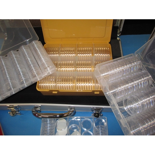 101 - A parcel of coin collectors accessories, to include cases and a cabinet, numerous display trays with... 