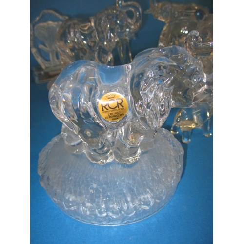 103 - A parcel of glass elephant sculptures, various sizes, one with a tiny chip to tail tip all others  w... 