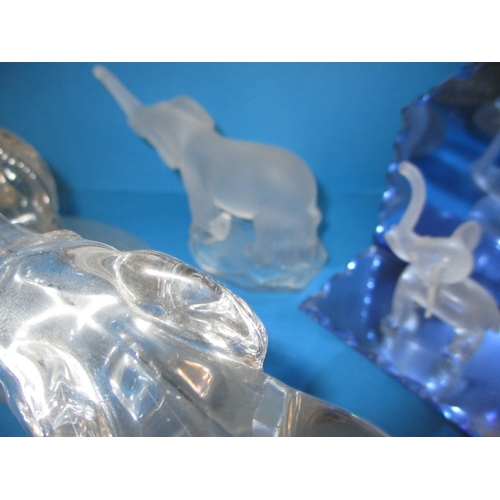 103 - A parcel of glass elephant sculptures, various sizes, one with a tiny chip to tail tip all others  w... 