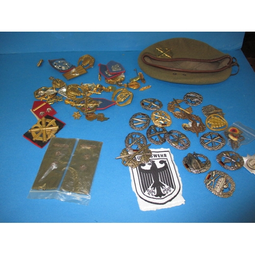 A parcel of military badges, most German or Dutch, all in good used condition