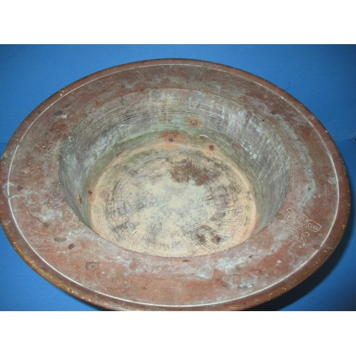 165 - A vintage oriental bronze footed bowl with signature to rim, having tarnish and age-related marks, a... 