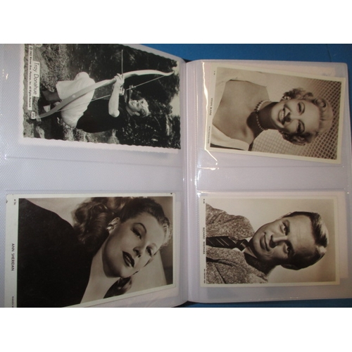 168 - An album of vintage film star fan picture cards, over 100 in total, all in good used condition