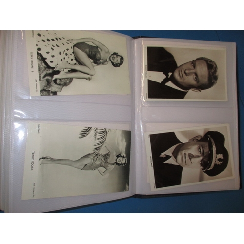 168 - An album of vintage film star fan picture cards, over 100 in total, all in good used condition