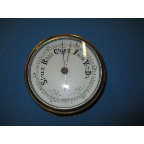 A vintage ships style barometer, approx. diameter 17cm, believed to be working but not tested as to function and with general use-related marks