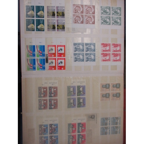 178 - A very large quantity of World stamps, to include mint examples, quads and variants, 16 albums in to... 