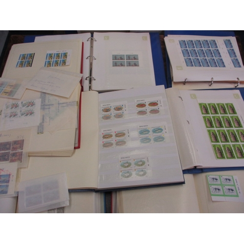 179 - A very large quantity of mainly Guernsey stamps, to include mint examples, part sheets, quads and va... 